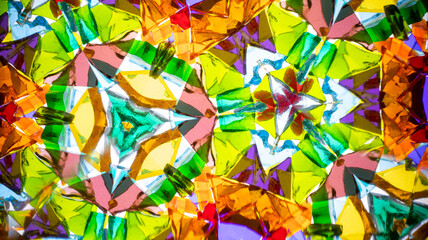 Stunning macro photograph of a natural kaleidoscope pattern, showcasing vibrant colored glass and...