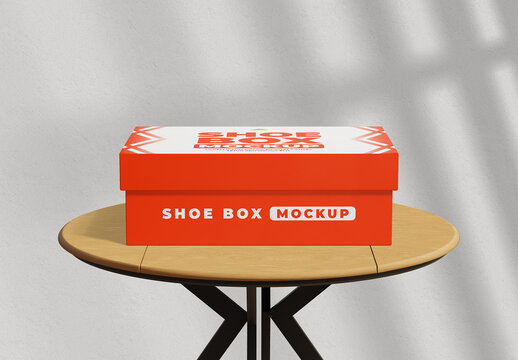 Stacked Red Shoe Box Mockup on a Round Table for Retail and E-commerce Branding