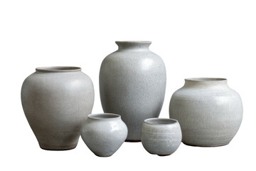 Ceramic vases group of gray textured handmade pottery on dark backdrop