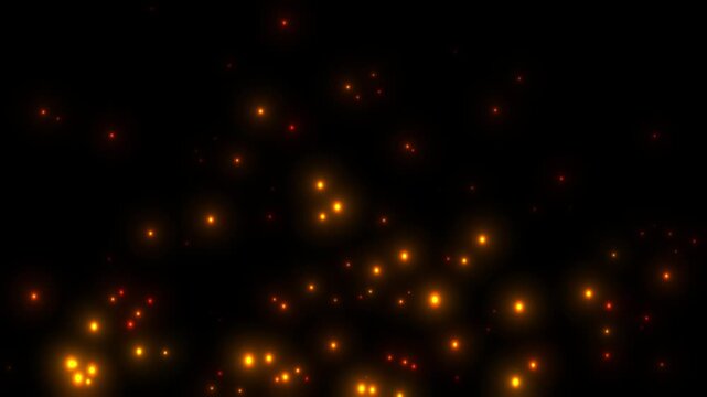 4k Flying Embers and Sparks. Fiery Orange Bonfire Particles Isolated black background. Bright glowing fire particles Hot burning fire sparks and ashes motion. Abstract dark glitter fire dust Loopable 