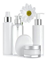 Collection of white cosmetic containers with a delicate daisy