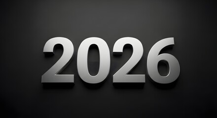 The year 2026 in silver metallic letters against a dark background, symbolizing the upcoming year and new beginnings with a sleek and modern design