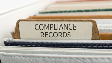 financial compliance legislation organization concept. Organized compliance records in a filing system.