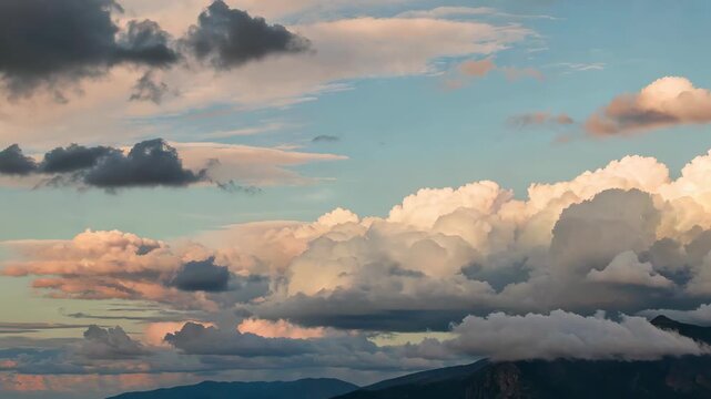 clouds are covering the mountains and the sky in the distance