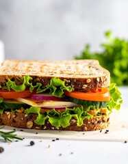 Delicious Vegetarian Sandwich with Fresh Vegetables on Whole Wheat Bread.