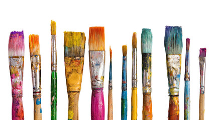 Row of used, colorful paintbrushes arranged against a dark backdrop