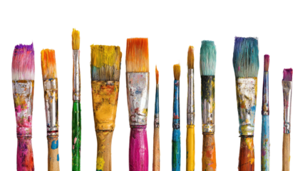 Row of used, colorful paintbrushes arranged against a dark backdrop