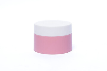 Small Pink Cosmetic Jar with White Lid on White Background