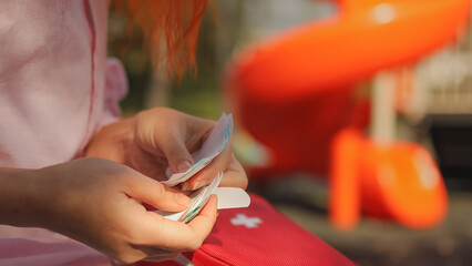 First aid kit. Children's playground. High-quality photo.
