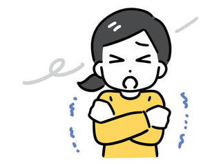 風が寒くて震えている薄着の若い女性