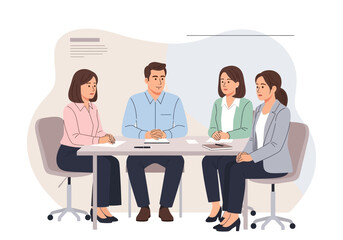 Business Meeting with Four Professionals at Table.