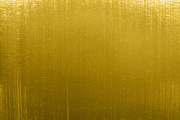 Luxury shiny gold foil surface texture background