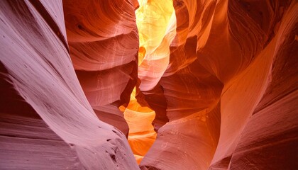 Explore the vibrant sandstone formations in Antelope Canyon, a magical journey through nature's artistry and geological wonder offering a sense of adventure and discovery within the canyon walls
