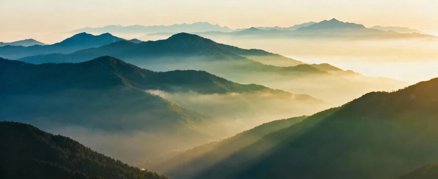 Beautiful mountain ranges with misty atmosphere at sunrise - Powered by Adobe