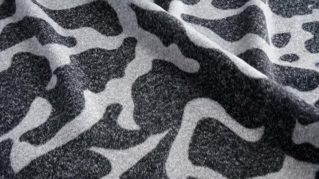 Close Up of Gray and White Animal Print Fabric Texture