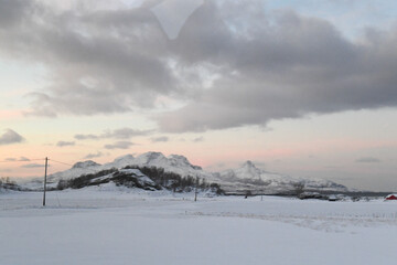 A snow-covered Fjord near the Mjelle community, just north of Bodo, on a wintery day in Arctic...