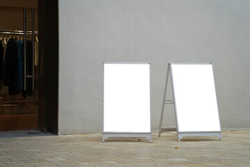 Double advertising stand banners mockup. Mock up of a standing poster,  outdoor stand mockup poster display at store front