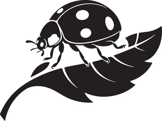 Black and white ladybug silhouette on a green leaf