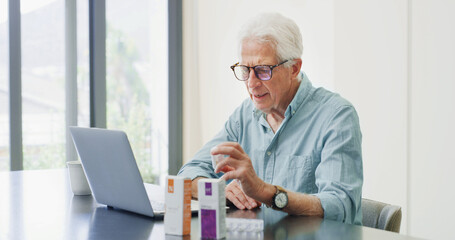 Medicine, pills and laptop with old man in home for dosage instruction, reading and side effects....
