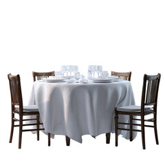 Elegant round table with white linen cloth and place settings