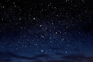 Obraz premium Night sky filled with sparkling stars over a tranquil landscape revealing the beauty of the universe at midnight