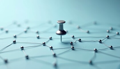 Prominent silver push pin stands as central node, linking minimalist network of metallic beads with strings on soft blue surface. Abstract graphic represents concepts like connection, strategy,