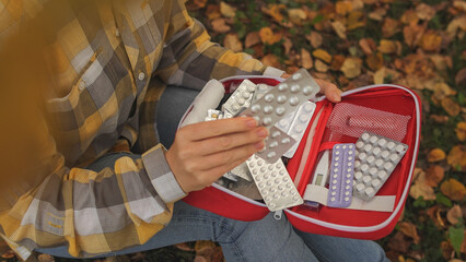 Autumn park. First aid kit. Tree in the park. High-quality photo.