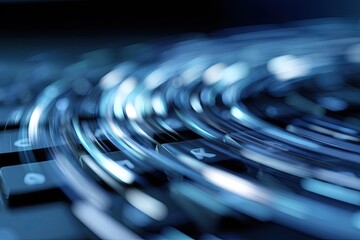 Abstract close-up showcases keyboard with blurred, flowing, luminous blue light streaks