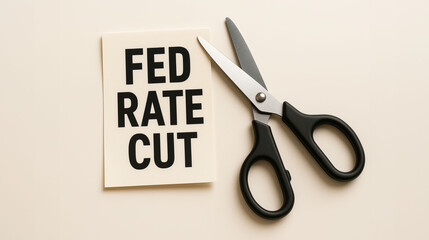 Fed rate cut concept with scissors showing interest rate reduction monetary policy decision by central bank representing financial market reaction economy growth and inflation control