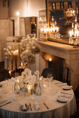 Elegant Dining Table with Flowers and Candles