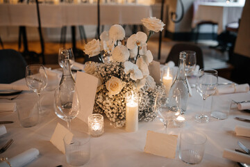 Elegant Wedding Table Setting with Floral Centerpiece