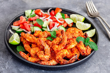 Juicy tandoori shrimp coated in vibrant red Indian spices