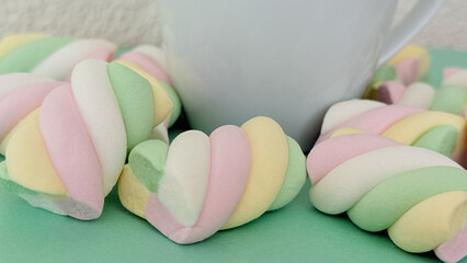 Close up marshmallows with cup