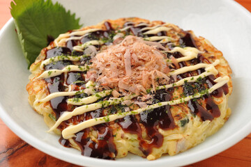 Japanese Okonomiyaki Pancake with Sauce and Bonito Flakes