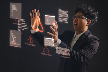 Cybersecurity alert concept with a man interacting with digital warning signs. Ideal for illustrating hacking threats, data breaches, system errors network security issues.