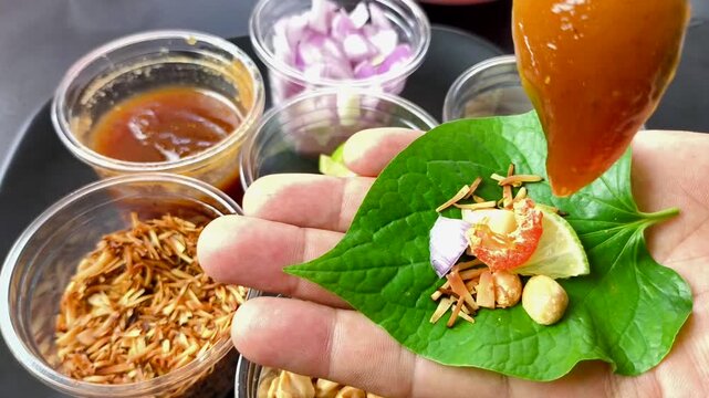 Savoury leaf wraps or Miang Kham  , Thai traditional food.