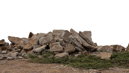Close-up low angle view isolate of concrete debris, removed from road demolition and dumped on the ground, commonly seen in rural Thai road construction.