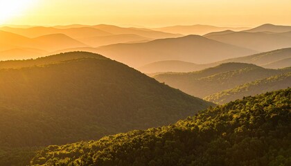 Golden sunset over layered mountain ranges