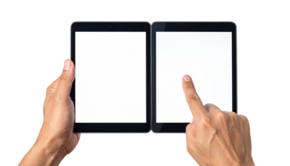 Hands holding two connected tablets with blank white screens against a dark background