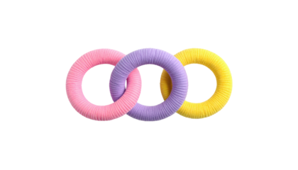 Three yarn-wrapped torus shapes, pink, lavender, and yellow, interlinked on a stark black background
