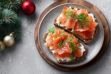 Two toasts with smoked salmon, cream cheese and dill for christmas brunch