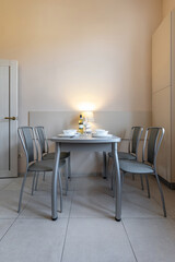 Modern Minimalist Dining Room with Lamp and Table Setting