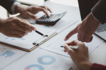 Business man group are meeting together in the office, they are meeting on the topic of finance and financial management, they are business partners. Concept financial management for startup companies