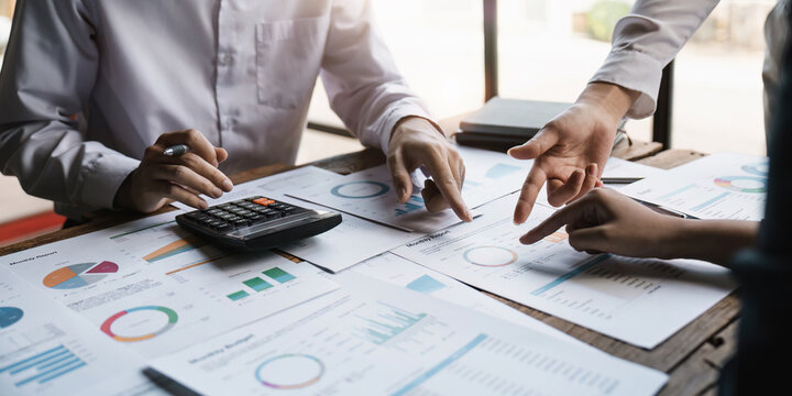 Business teamwork hands, paperwork graphs and planning annual report data, research and office budget. Company discussion with documents in strategy meeting, analytics progress and financial stats