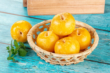 Raw ripe sweet yellow plums