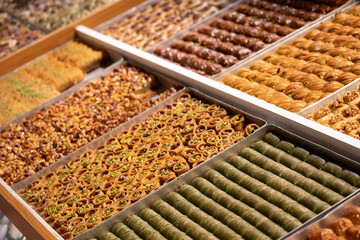 Trays of assorted traditional Turkish baklava in an Istanbul shop