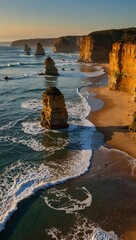 Golden hour light illuminates towering sea stacks rugged cliffs and a sandy beach with foamy waves