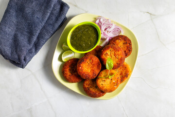 "Dahi ke kebab", a creamy, spiced yogurt patties mixed with herbs and breadcrumbs, shallow-fried to golden perfection, soft inside, crisp outside.
