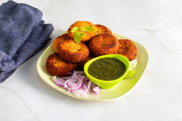 "Dahi ke kebab", a creamy, spiced yogurt patties mixed with herbs and breadcrumbs, shallow-fried to golden perfection, soft inside, crisp outside.
