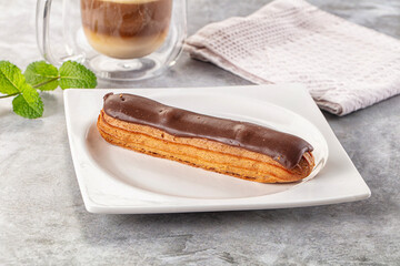 Gourmet chocolate eclair with icing